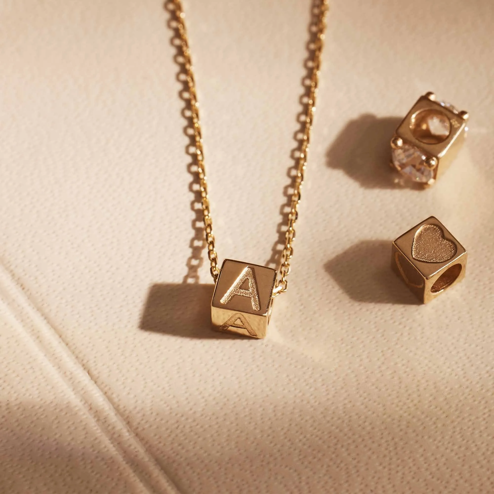 Le Marais Felie 14 karat gold cube charm with heart