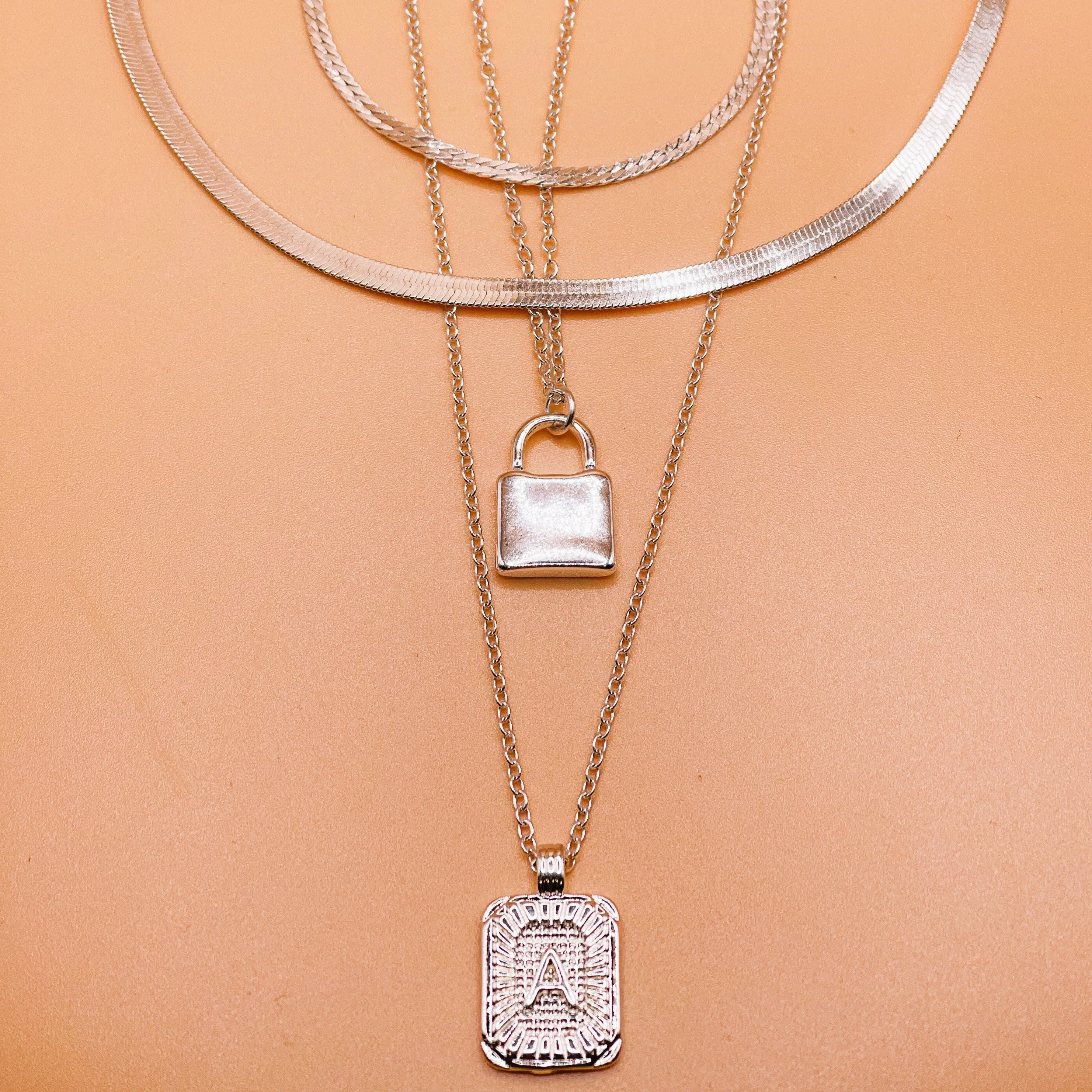 Silver Initial Letter and Lock Multi Layer Necklace in Silver Setting