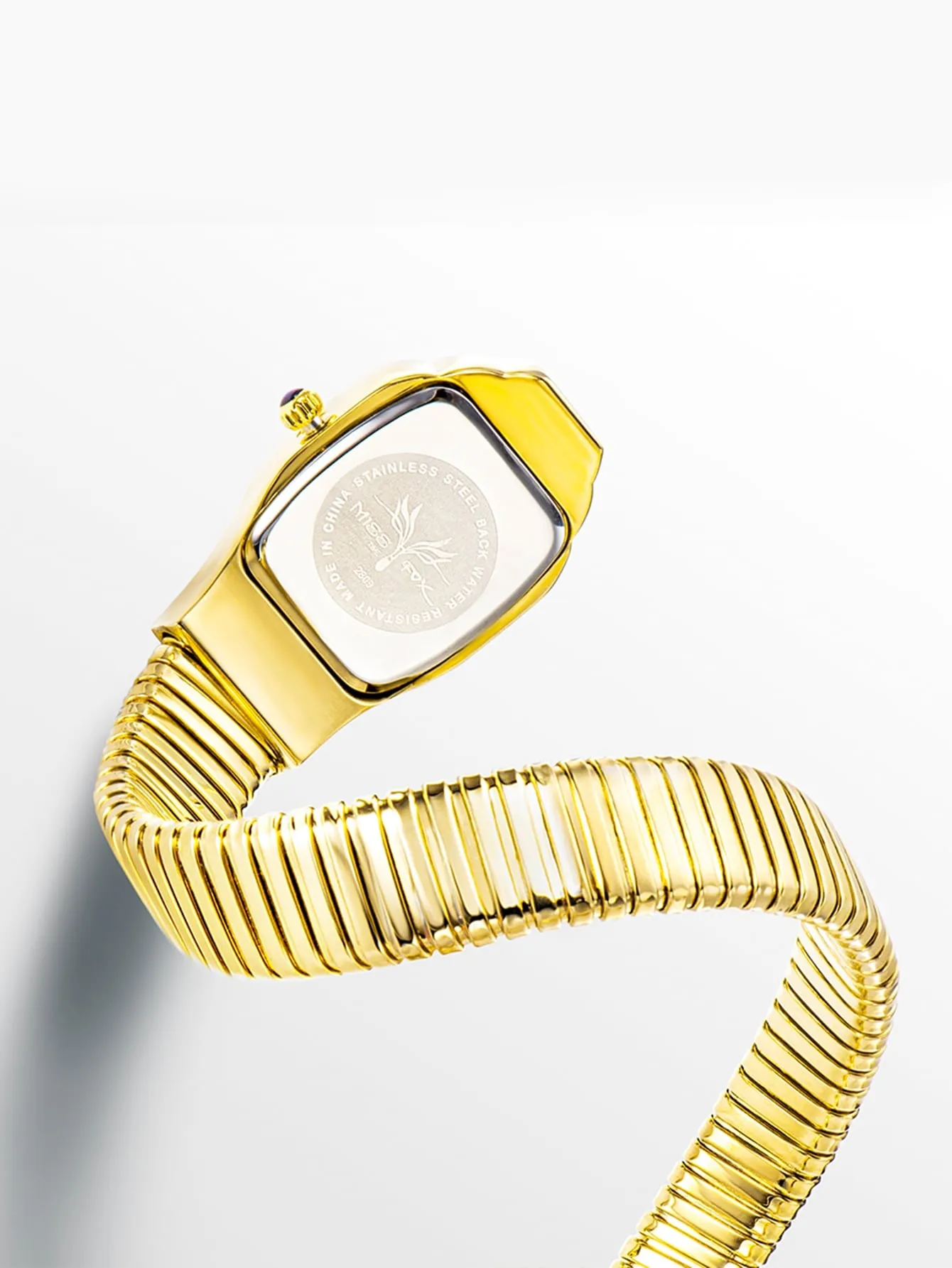 Women Gold Copper Strap Fashionable Geometric Dial Quartz Watch